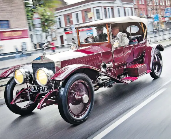  ??  ?? A Silver Ghost drives in a re-creation of the endurance trial that earned the model its name. — ROLLS-ROYCE MOTOR CARS FILES