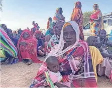  ?? PROVIDED BY REFUGEES INTERNATIO­NAL ?? Kamisa Abdullah, 30, escaped a massacre in Ardamata, Sudan, in November with only her 5-month-old baby. She was separated from her three other children, who fled with her sister.