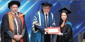  ?? ?? Chee (right) receiving her book Prize award from university of Plymouth senior deputy vice chancellor Prof dafydd moore (middle) and Peninsula Higher education Group president Prof dr Ian robert Pashby (left).