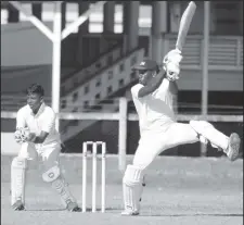  ??  ?? Andrew Lyght Jr. cracks one over point during his breezy knock for PSC