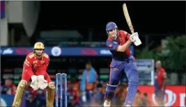  ?? PTI ?? Mitchell Marsh of Delhi Capitals plays a shot during the 64th T20 cricket match of the Indian Premier League 2022 (IPL season 15), between the Punjab Kings and the Delhi Capitals, at DY Patil Stadium in Mumbai, Monday