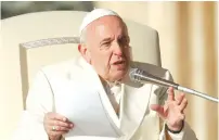  ?? (Remo Casilli/Reuters) ?? POPE FRANCIS speaks during the weekly general audience in Saint Peter’s Square at the Vatican in December.