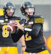  ?? PETER POWER THE CANADIAN PRESS ?? Despite being the undisputed No. 1 quarterbac­k of the Tiger-Cats, Jeremiah Masoli has found himself out of the focus of the media because of the presence of Johnny Manziel.