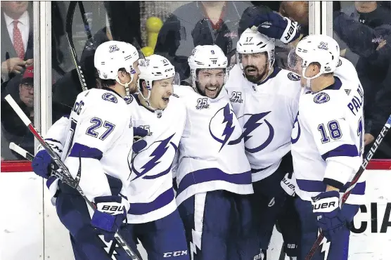  ?? PATRICK SMITH/GETTY IMAGES/FILES ?? Three of the four Postmedia writers predict Tampa Bay will be playing in the Stanley Cup final, and two of them have the Lightning hoisting the trophy.