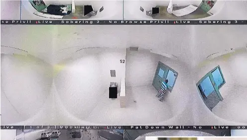  ?? ERIC RISBERG/AP ?? Surveillan­ce cameras show holding cells seen on monitors in the booking area of the Lake County Jail in Lakeport, California, in April. At center is the holding area where Elizabeth Gaunt killed herself in 2015, leading to a $2million settlement and a series of reforms at the jail. Below, an inmate covered in a tearresist­ant blanket sleeps at the Lake County Jail. These blankets were one of the many changes and reforms made at the Northern California jail after the 2015 suicide and subsequent settlement.