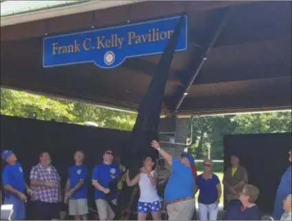  ?? SUBMITTED PHOTO ?? The sign for the newly named Frank C. Kelly Pavilion is revealed at Collingdal­e Park Thursday