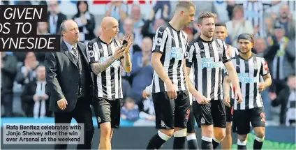  ??  ?? Rafa Benitez celebrates with Jonjo Shelvey after the win over Arsenal at the weekend