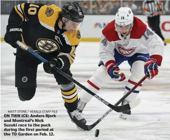  ?? MATT STONE / HERALD STAFF FILE ?? ON THIN ICE: Anders Bjork and Montreal’s Nick Suzuki race to the puck during the first period at the TD Garden on Feb. 12.