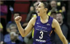  ?? ELAINE THOMPSON — THE ASSOCIATED PRESS FILE ?? In this file photo, Phoenix Mercury’s Diana Taurasi reacts to a call in their favor against the Seattle Storm in the first half of a WNBA basketball game, in Seattle.