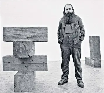  ?? ?? Carl Andre, above, in 1978; right, an installati­on by him at the Whitechape­l Gallery in 2012; far right, his assembly of firebricks Equivalent VIII in 1976, watched over by Tate Gallery attendant Arthur Payne, who told a reporter that he did not think people could ‘make head or tail’ of it