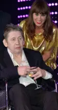  ??  ?? AWARD: Shane MacGowan with Victoria Mary Clarke