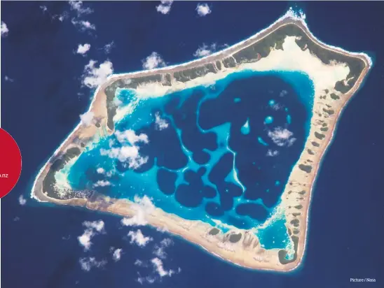  ?? Picture / Nasa ?? The $8.5 million project to power Tokelau’s atolls has won the 2014 EECA renewable energy award.