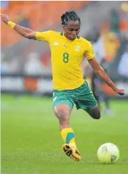  ?? /Gallo Images ?? Equipoise: Siphiwe Tshabalala is perfectly balanced as he shoots for goal in a Bafana match in 2013.