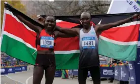  ?? York City Marathon. Photograph: Andrew Kelly/Reuters ?? Kenya's Sharon Lokedi and Evans Chebet pose after winning the women’s and men’s New