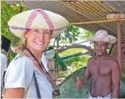  ??  ?? We were showered with gifts, as Susie receives a traditiona­lly woven hat