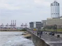  ?? — AFP ?? A general view of the Chinese-managed terminal of the Colombo port is seen from the Galle Face promenade in Colombo.