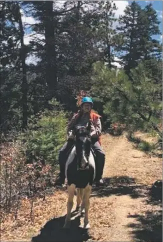  ?? COURTESY PHOTO ?? Jean Smith rides her horse, Jackson.