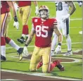  ?? RANDY VAZQUEZ — BAY AREA NEWS GROUP ?? The 49ers’ George Kittle looks up at the big screen after failing to catch a two-point conversion versus the Eagles at Levi’s Stadium in Santa Clara on Sunday.