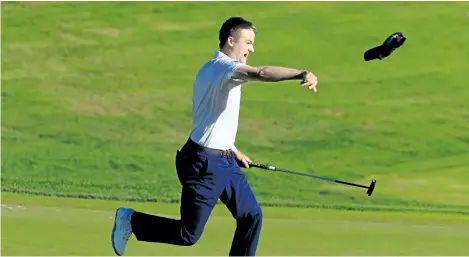  ?? MICHAEL COHEN/GETTY IMAGES ?? Russell Knox throws his hat in celebratio­n after winning the Travelers Championsh­ip last year in Cromwell, Conn.