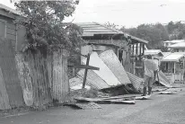  ?? AP Photo/Johnny Jno-Baptiste ?? A man surveys the wreckage on his property Wednesday after the passing of Hurricane Irma in St. John's, Antigua and Barbuda. Heavy rain and 185-mph winds lashed the Virgin Islands and Puerto Rico's northeast coast as Irma, the strongest Atlantic Ocean...