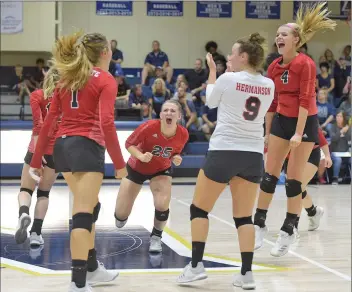  ?? Dan Watson/The Signal (See additional photos on signalscv.com) ?? Santa Clarita Christian School celebrates a point against Trinity Classical Academy at The Master’s University on Tuesday. The Cardinals swept the Knights for the second time this season.