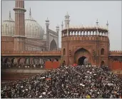  ?? ALTAF QADRI — THE ASSOCIATED PRESS ?? Indians gather for a protest against the Citizenshi­p Amendment Act after Friday prayers outside Jama Masjid in New Delhi, India, on Friday.