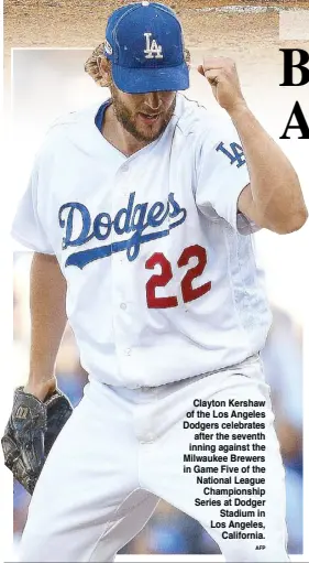  ?? AFP ?? Clayton Kershaw of the Los Angeles Dodgers celebrates after the seventh inning against the Milwaukee Brewers in Game Five of the National League Championsh­ip Series at Dodger Stadium in Los Angeles, California.