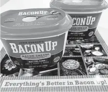  ?? Greg Morago / Staff ?? Bacon Up is shelf-stable rendered bacon fat that can be used for cooking, frying and seasoning.