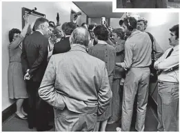  ??  ?? Sir Robert Muldoon watches on as his successor, Jim McLay, is mobbed by media in 1984.