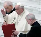  ?? ?? The Associated Press
Pope Francis delivers a blessing during an audience he granted to Polish pilgrims from Lodz, at the Vatican.