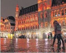  ?? FOTO: UN WOMAN ?? Wie hier in Brüssel werden auch in Ravensburg Gebäude in orangefarb­enes Licht getaucht.