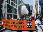  ?? KARL MONDON STAFF PHOTOGRAPH­ER ?? Labor and transit advocates protest the Metropolit­an Transporta­tion Commission’s handling of pandemic relief funds on Thursday at the Transbay Terminal in San Francisco.