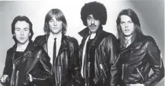  ?? ?? Main picture: Thin Lizzy in 1983, by Andy Small.
Above from top: Phil Lynott on stage in 1980, picture by Simon Matthews; Portsmouth Guildhall; Thin Lizzy, from left: Brian Downey, Snowy White, Phil Lynott, Scott Gorham, c.1980-83 Far-left inset: Music historian Richard Houghton Near-left inset: Phil Lynott in 1983. Picture by Andy Small