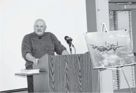  ?? Sam Macdonald ?? Pictou author Gary Chisholm, at the People’s Place Library in Antigonish, discusssin­g his novels, The One-eyed Gunner and Run Benny, Run.