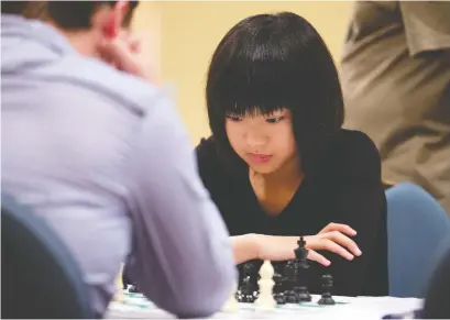  ?? WAYNE CUDDINGTON FILES ?? Ottawa's Qiyu Zhou, then 14, concentrat­es during the Canadian Open Chess Championsh­ips in 2013.