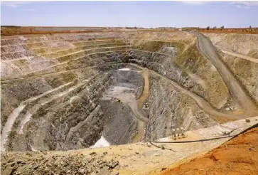  ??  ?? The KCGM Super Pit was consolidat­ed from a range of small mining operators in 1989.