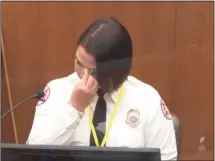  ?? Court TV via AP, Pool ?? In this image from video, Minneapoli­s Firrefight­er Genevieve Hansen wipes her eyes as she testifies on Tuesday in the trial of former Minneapoli­s Police Officer Derek Chauvin in the May 25, 2020, death of George Floyd.