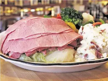  ?? Paula Murphy ?? Kenny & Ziggy’s celebrates St. Patrick’s Day with a special deal on its corned beef and cabbage dinner. The deal is good from 6 p.m. to close.