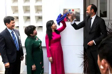  ??  ?? Philippe (right) and Vietnam’s health minister Nguyen Thi Kim Tien inaugurate a medical centre in Ho Chi Minh City. — AFP photo