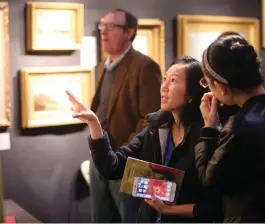  ??  ?? Attendees view artwork in Avery Galleries’ booth during the 2018 Gala. Photo by Tara Carvalho.