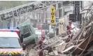  ?? Photograph: Sameer Al-Doumy/AFP/Getty Images ?? Firefighte­rs inspect the collapsed building in Lille on Saturday.