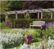  ?? ?? Clockwise from left A terrace in Kingston upon Thames now includes a kitchen and seating; a classic pergola in West Sussex; lawns in this garden were redesigned for a more intimate feel; more relaxed seating.