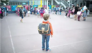  ?? MARTIN BUREAU/GETTY IMAGES ?? Back to school can be a stressful time for both parents and children as multiple pressures, including academic and social media strains, take their toll on kids.