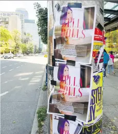 ?? ARLEN REDEKOP ?? Posters are up at Burrard and Robson advertisin­g the city’s first sex doll brothel, which is preparing to open in November.