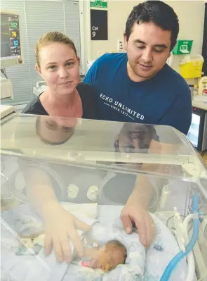  ??  ?? Cairns couple Nicole and David McGarry with Ethan at the Townsville University Hospital. Picture: Evan Morgan