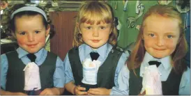  ?? ?? Rathcormac junior infants Meg Kelleher, Fiona O’Flynn and Aoife Howard just can’t wait to show off their arts and crafts for the camera in 2002.