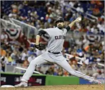  ?? LYNNE SLADKY — THE ASSOCIATED PRESS ?? American League’s Cleveland Indians pitcher Andrew Miller throws a pitch, during the tenth inning at the MLB baseball AllStar Game, Tuesday in Miami. The American League defeated the National League 2-1.
