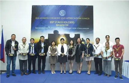  ?? SUNSTAR FOTO / RUEL ROSELLO ?? PARTNERS. To celebrate its 25th anniversar­y, the Bangko Sentral ng Pilipinas awarded partners who have provided informatio­n in their regular surveys, which are used to to come up with policies and gauge the country’s economic performanc­e.