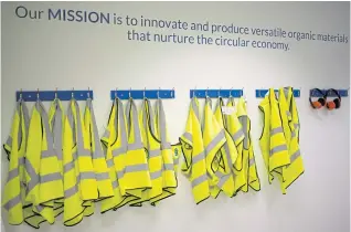  ?? PHOTOS BY AP ?? Safety jackets hang at the UBQ factory.