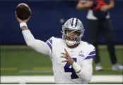  ?? MICHAEL AINSWORTH — THE ASSOCIATED PRESS FILE ?? Cowboys quarterbac­k Dak Prescott and Dallas has finally agreed on a contract two years after negotiatio­ns began with the star quarterbac­k. The team the agreement was reached on Monday.